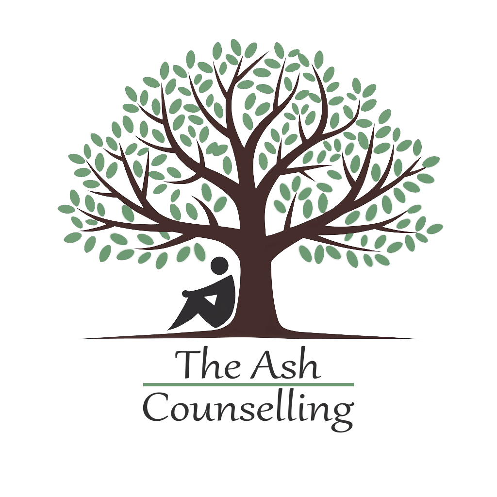 Happy person using laptop for online counselling